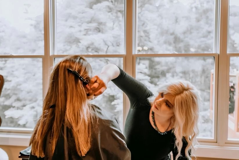 Hannah Styer — blonde specialist and owner of Hannah Rae Spa-Studio, at work in her East Louisville studio
