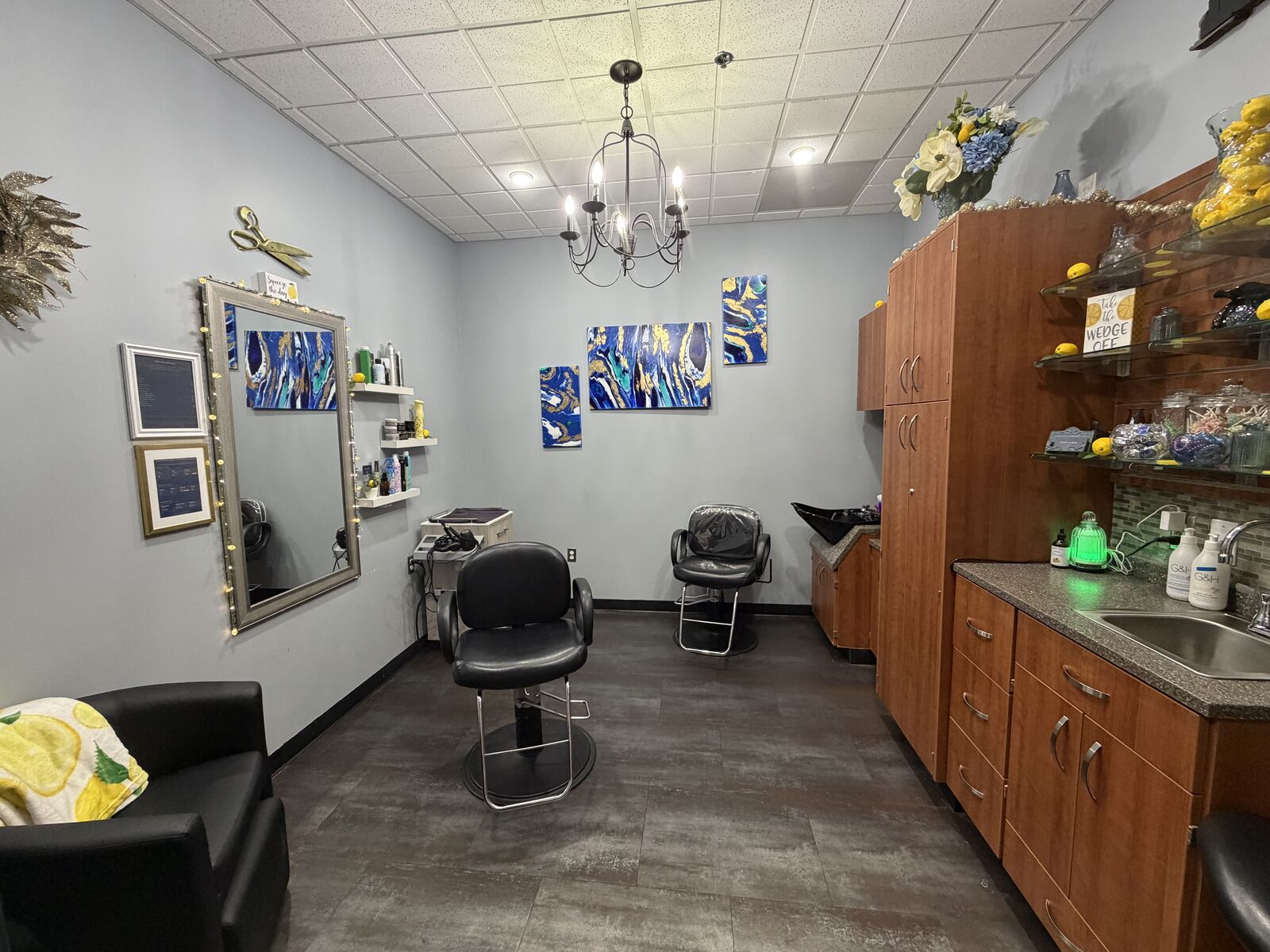 Hannah Rae Spa-Studio interior — mirror, art, private chairs